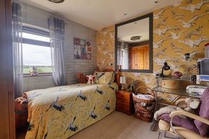 Bedroom Three- click for photo gallery